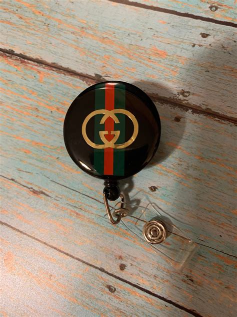 Gucci Badge Reel 